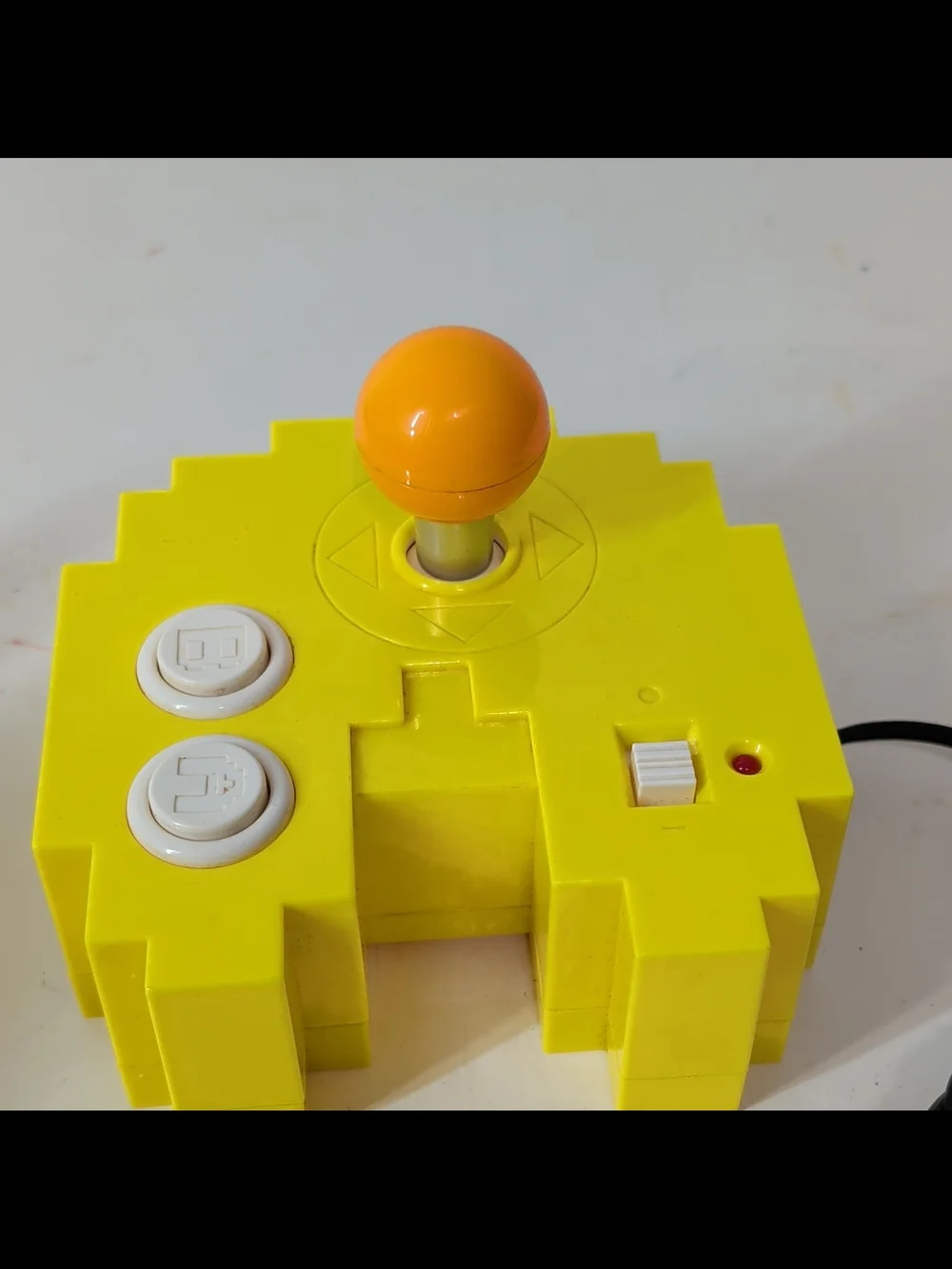 Yellow Retro Arcade Joystick with Orange Ball Top